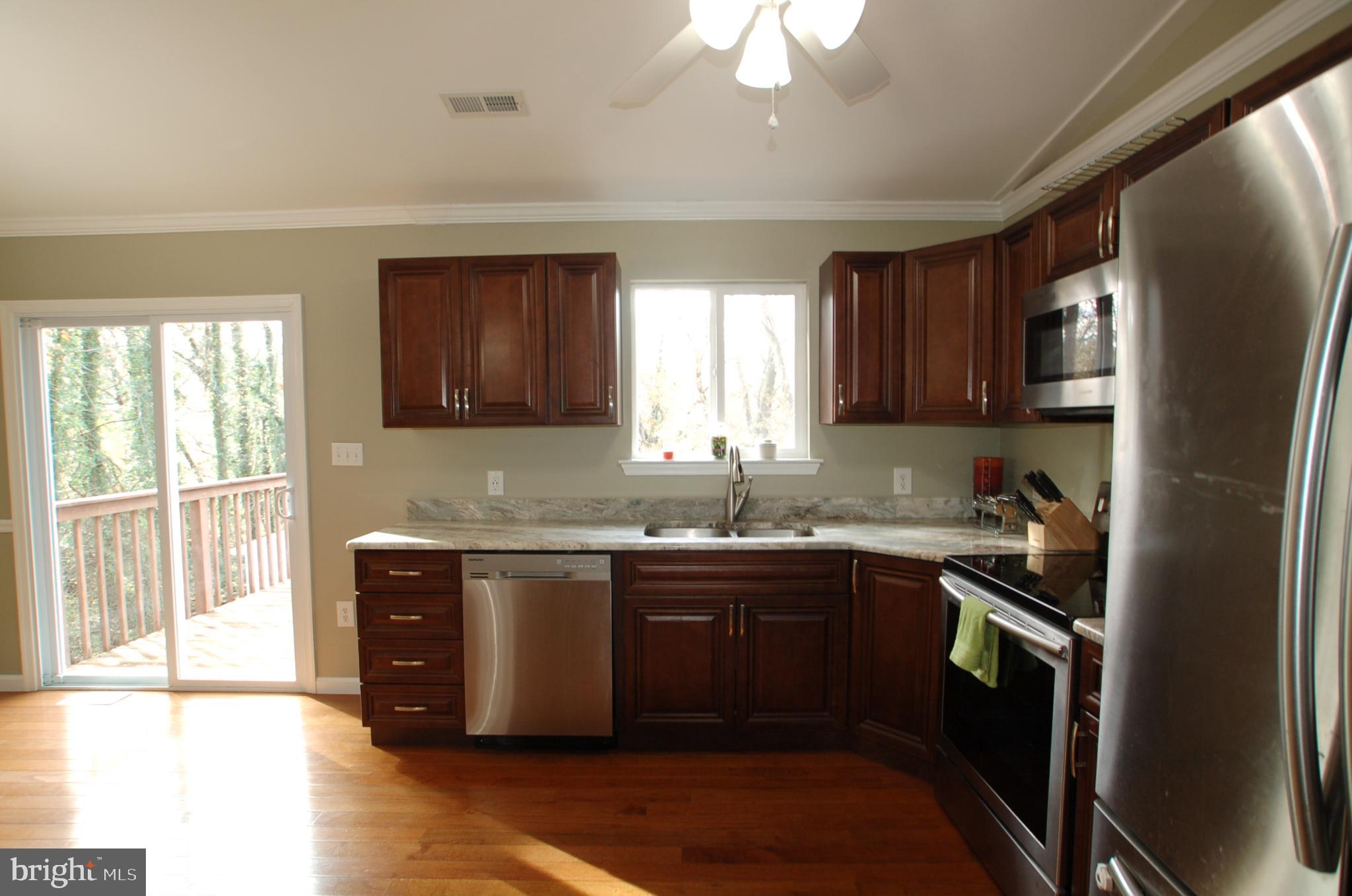 8275 Sycamore Road Lusby, MD 20657 - Photo 5 of 19 Kitchen - solid hardwood cabinetry