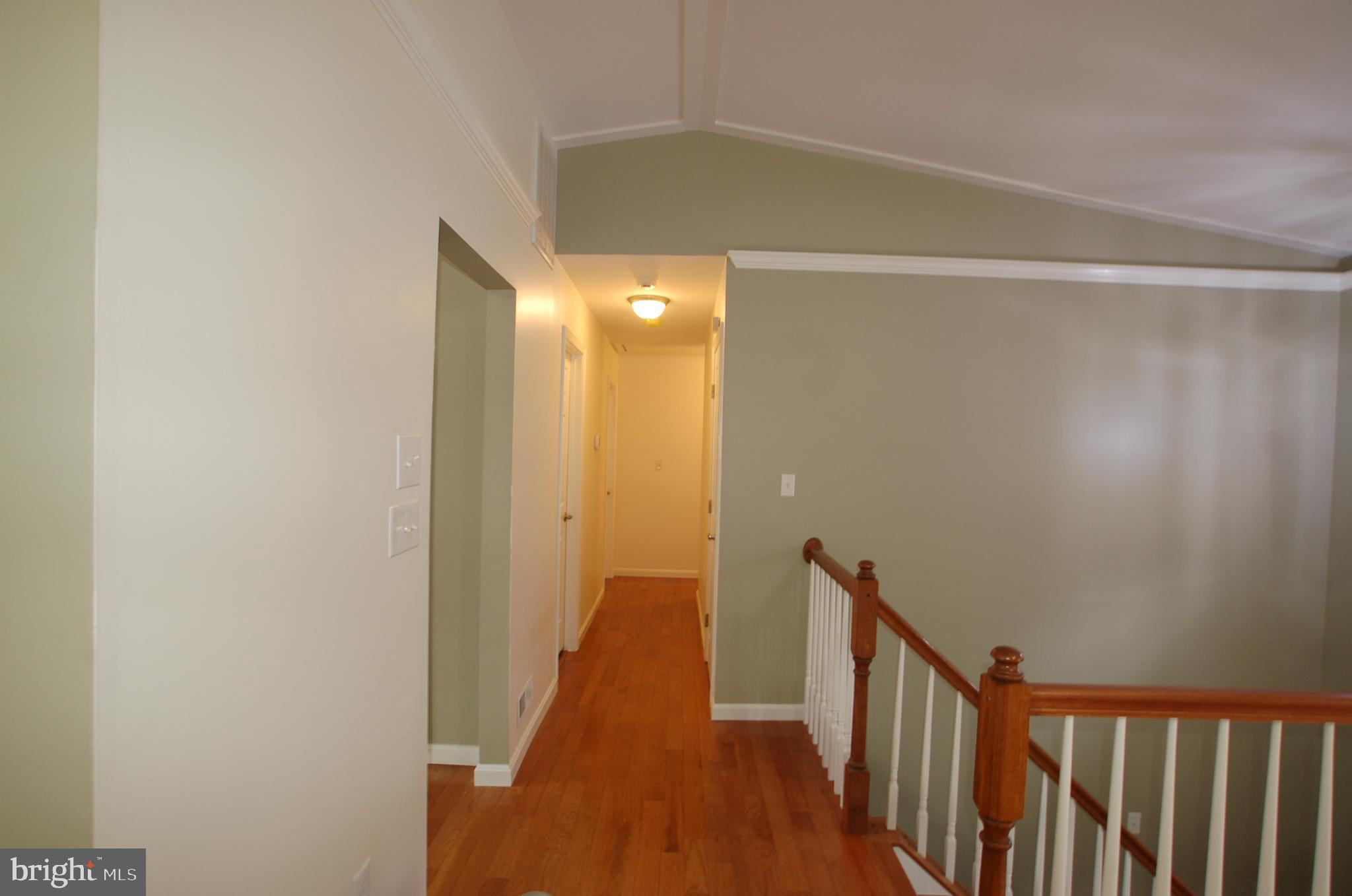 8275 Sycamore Road Lusby, MD 20657 - Photo 7 of 19 Bedroom hallway