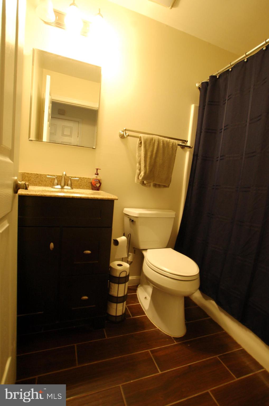 8275 Sycamore Road Lusby, MD 20657 - Photo 8 of 19 Hall Bathroom