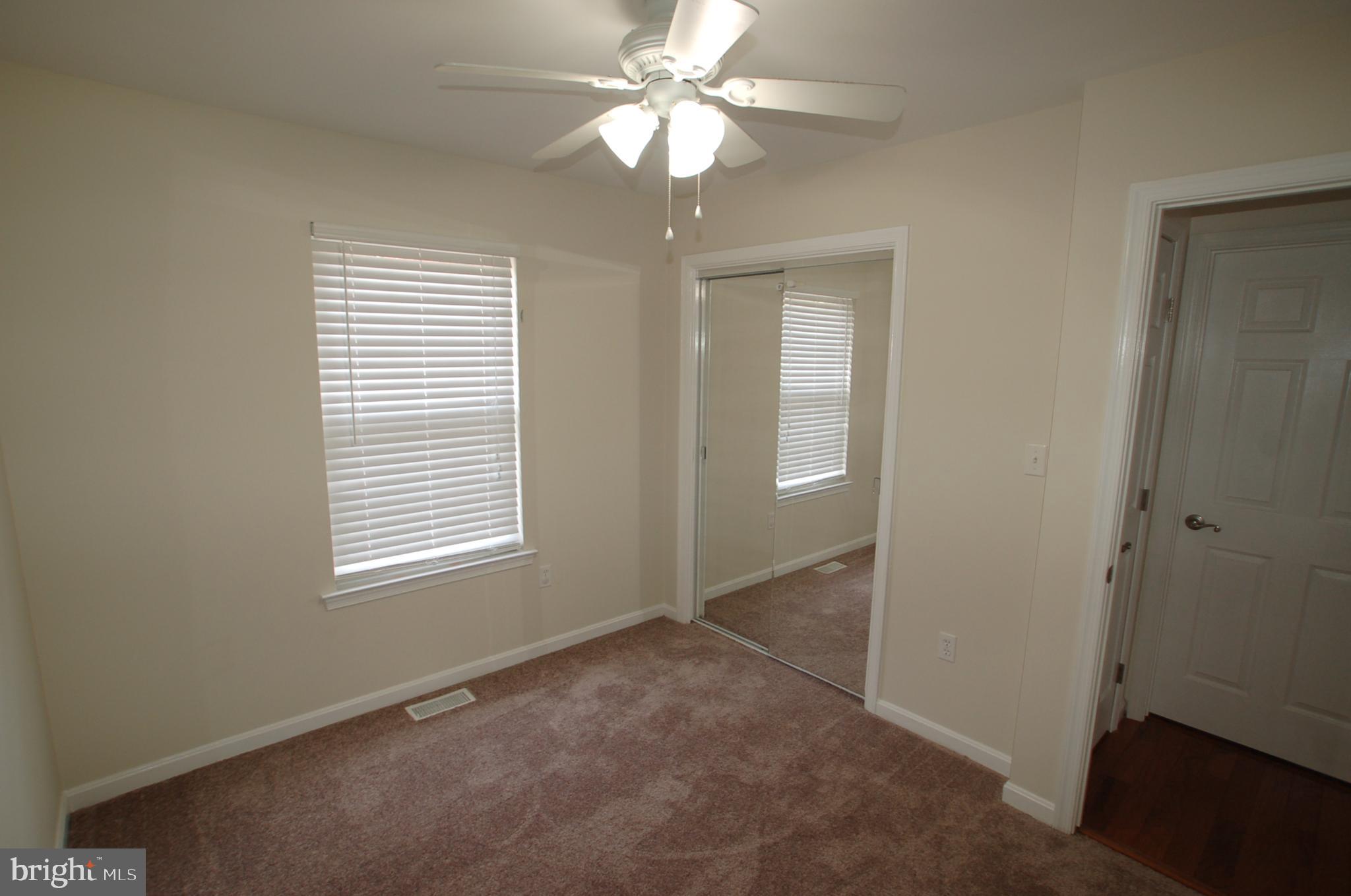8275 Sycamore Road Lusby, MD 20657 - Photo 10 of 19 Bedroom 2 - 10'5" x 9' (Bedroom 3 same size)