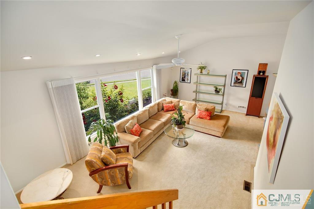 5 Steelox Road East Brunswick, NJ 08816 - Photo 14 of 24 a living room with furniture and a large window