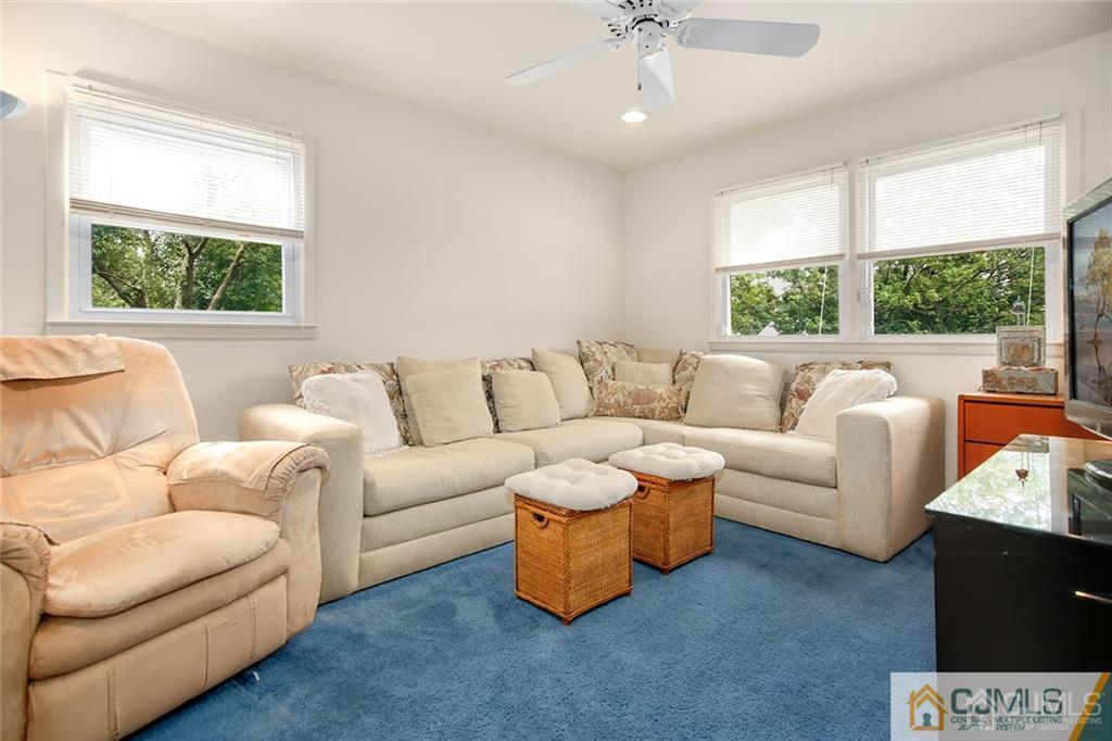 5 Steelox Road East Brunswick, NJ 08816 - Photo 18 of 24 a living room with furniture and a large window