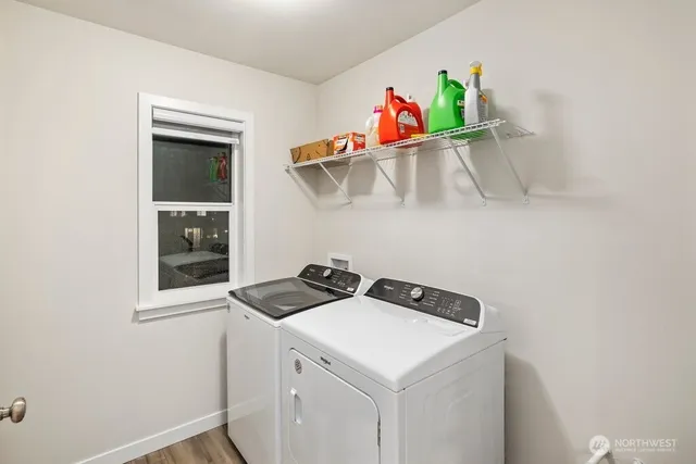 a utility room with dryer and washer