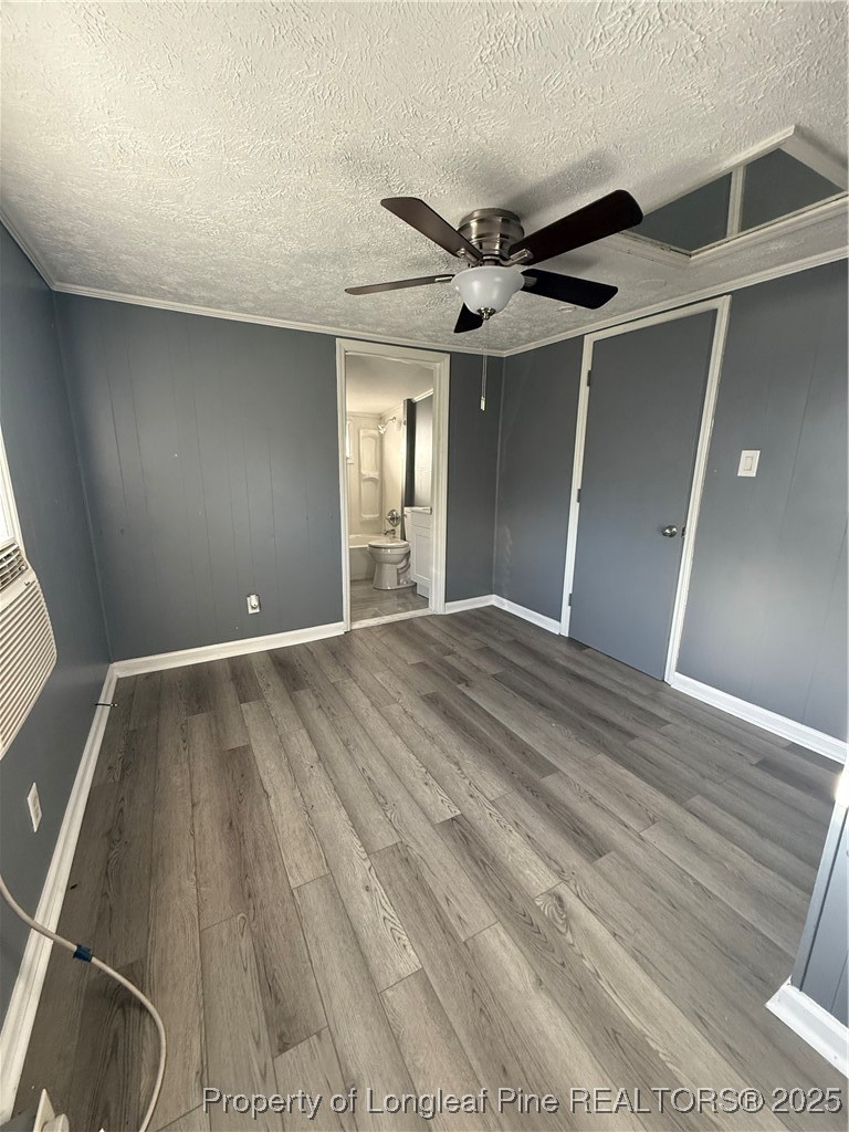 7395 3rd Street Wade, NC 28395 - Photo 11 of 15 a view of a big room with wooden floor and windows