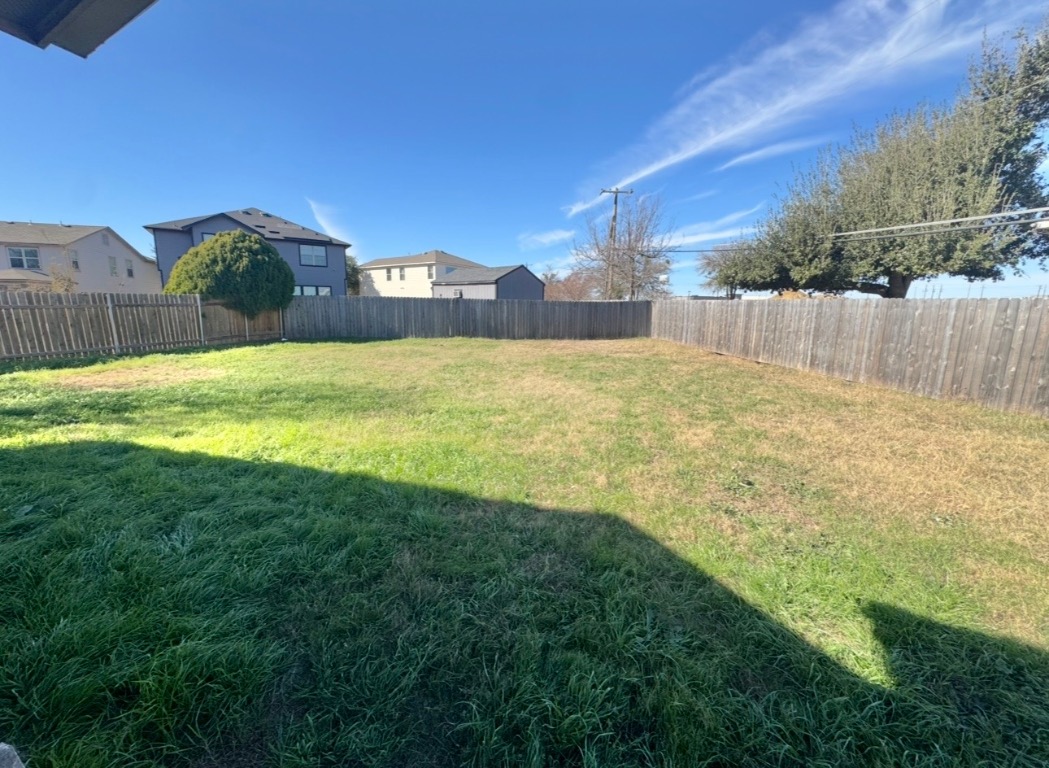 110 Comal Cove Elgin, TX 78621 - Photo 23 of 25 View of fenced backyard