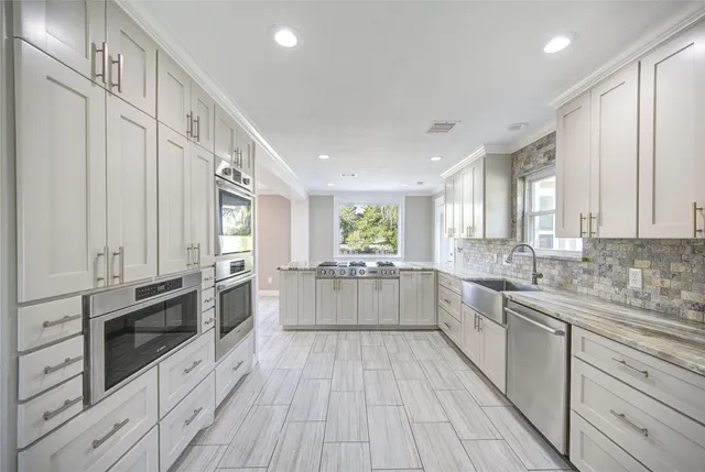 $574,999 | 303 Old Bayou Drive, Dickinson, TX 77539