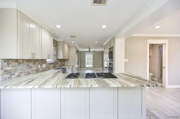 $554,999 | 303 Old Bayou Drive, Dickinson, TX 77539