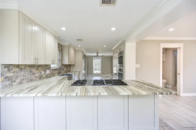 $574,999 | 303 Old Bayou Drive, Dickinson, TX 77539