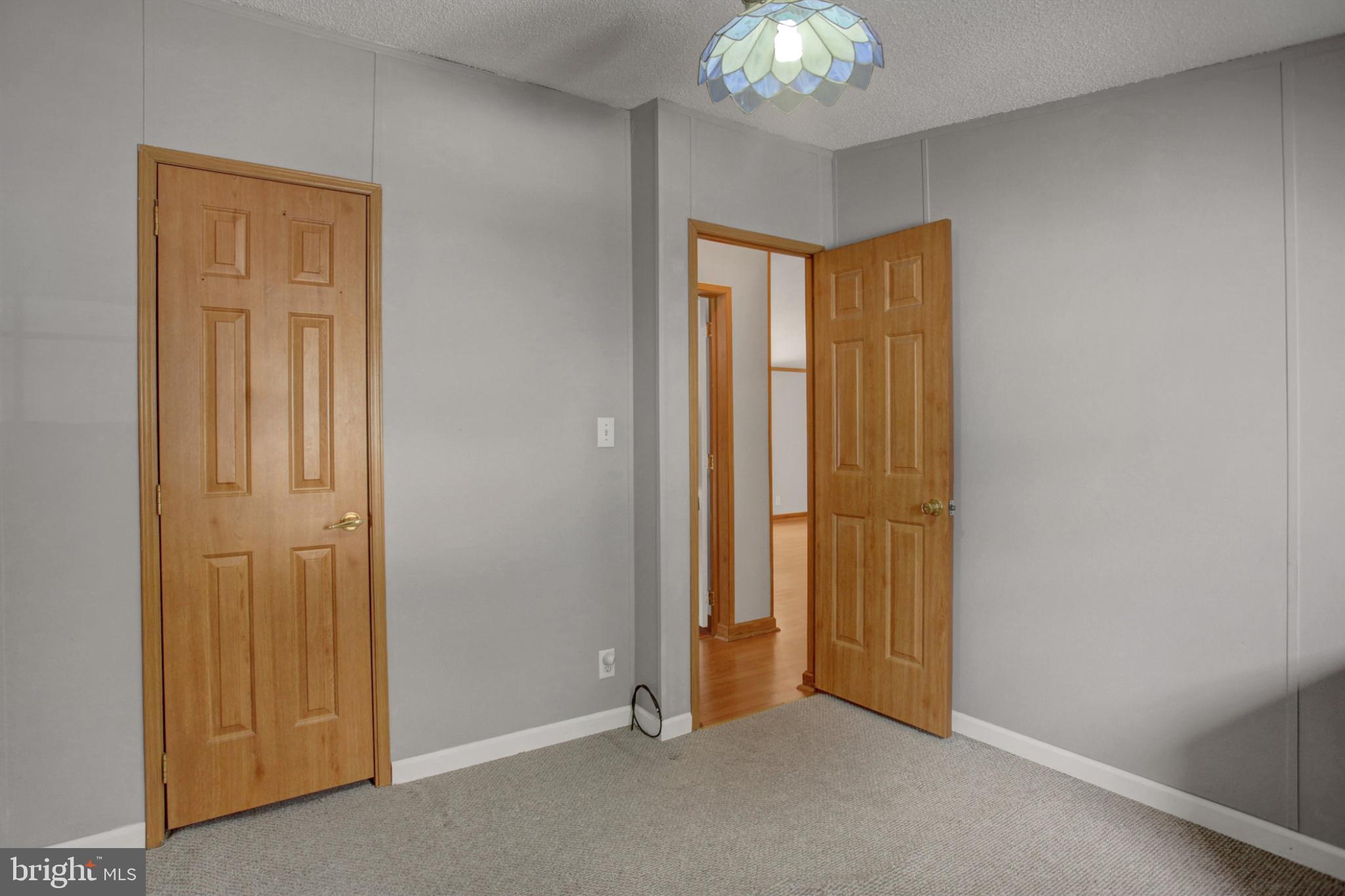 15134 North Young Road Greencastle, PA 17225 - Photo 23 of 30 Inviting space with warm wooden doors.