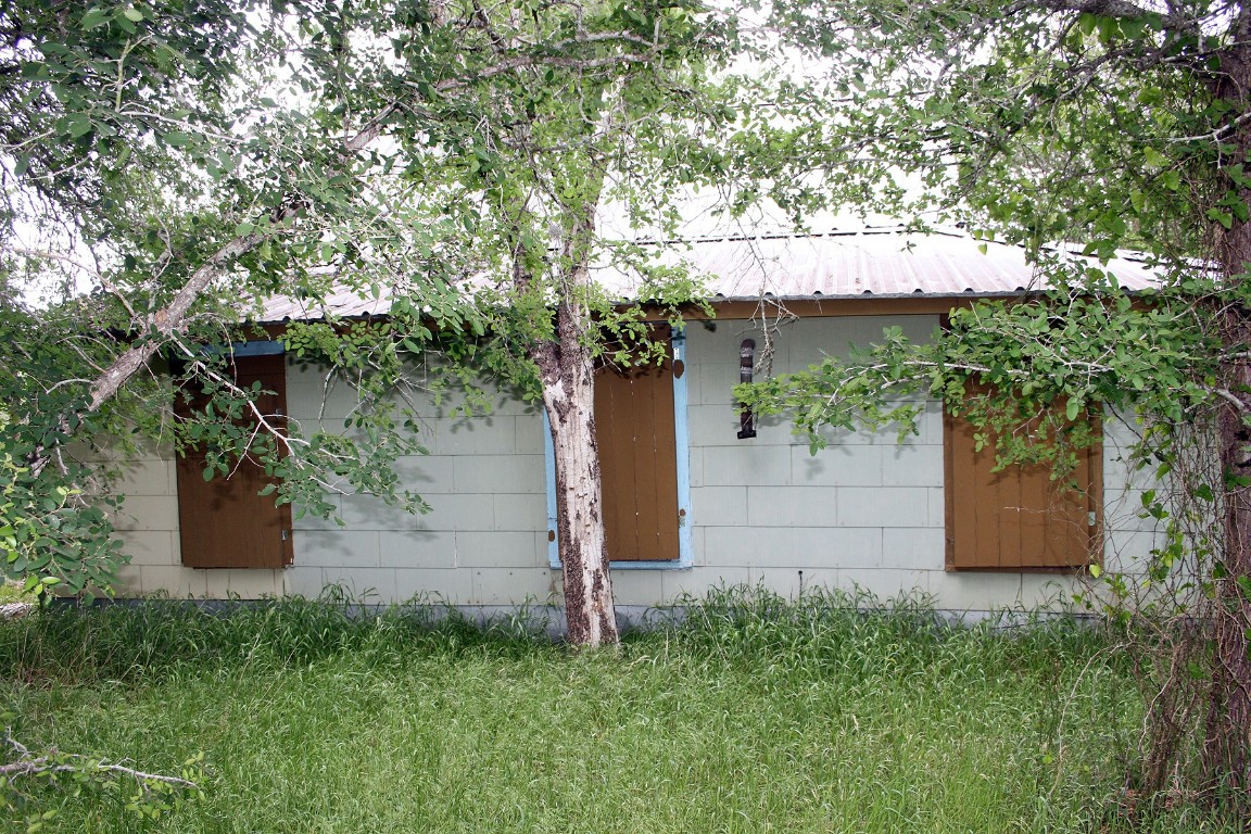 7887 Pettytown Road Red Rock, TX 78662 - Photo 15 of 26 a view of a backyard