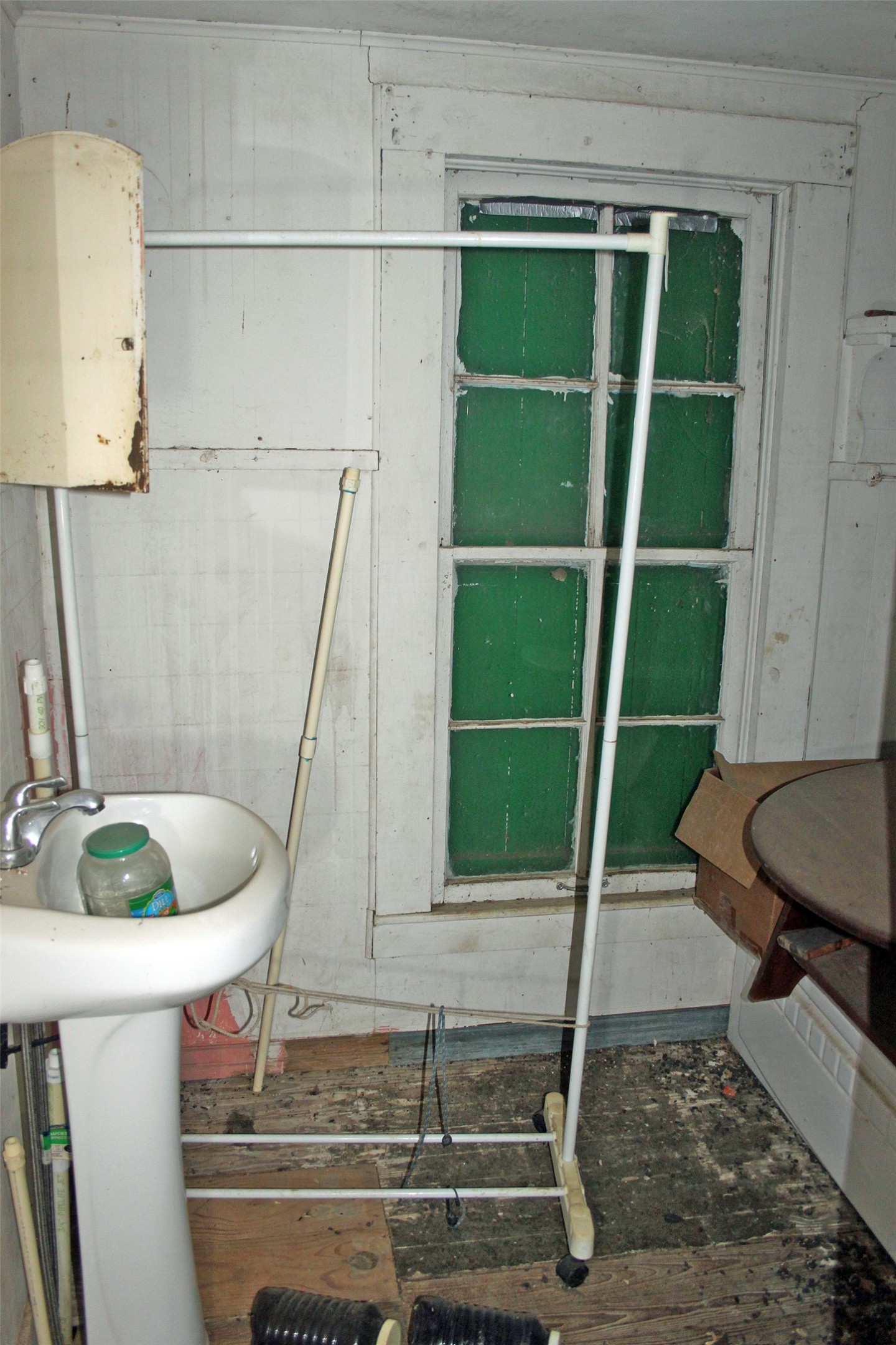 7887 Pettytown Road Red Rock, TX 78662 - Photo 8 of 26 a room with a sink and mirror