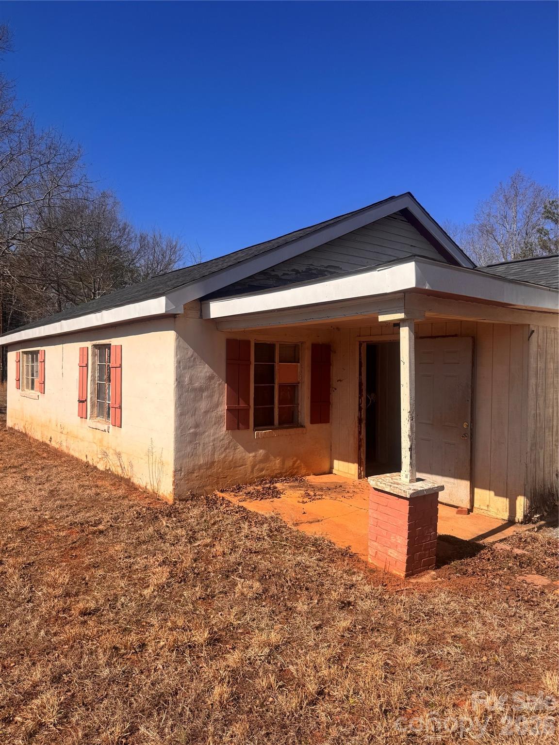 985 Spindale Street Spindale, NC 28160 - Photo 2 of 6 a front view of a house with a yard