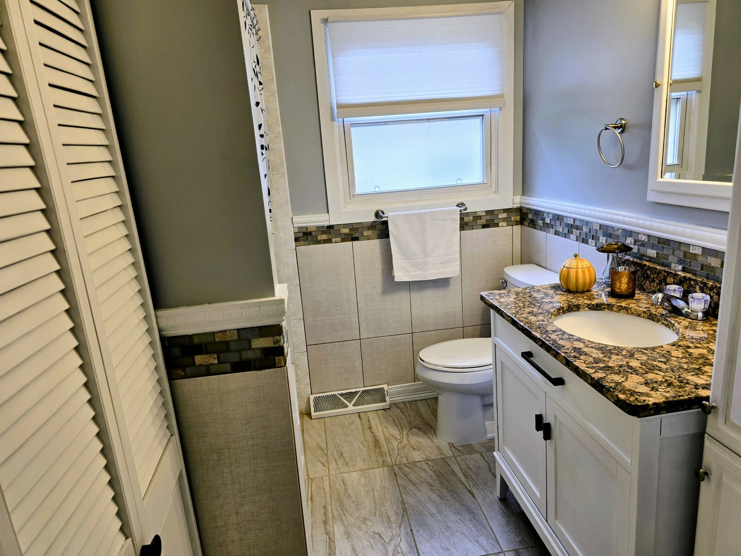 3618 148th Street Midlothian, IL 60445 - Photo 12 of 22 a bathroom with a granite countertop toilet sink and mirror