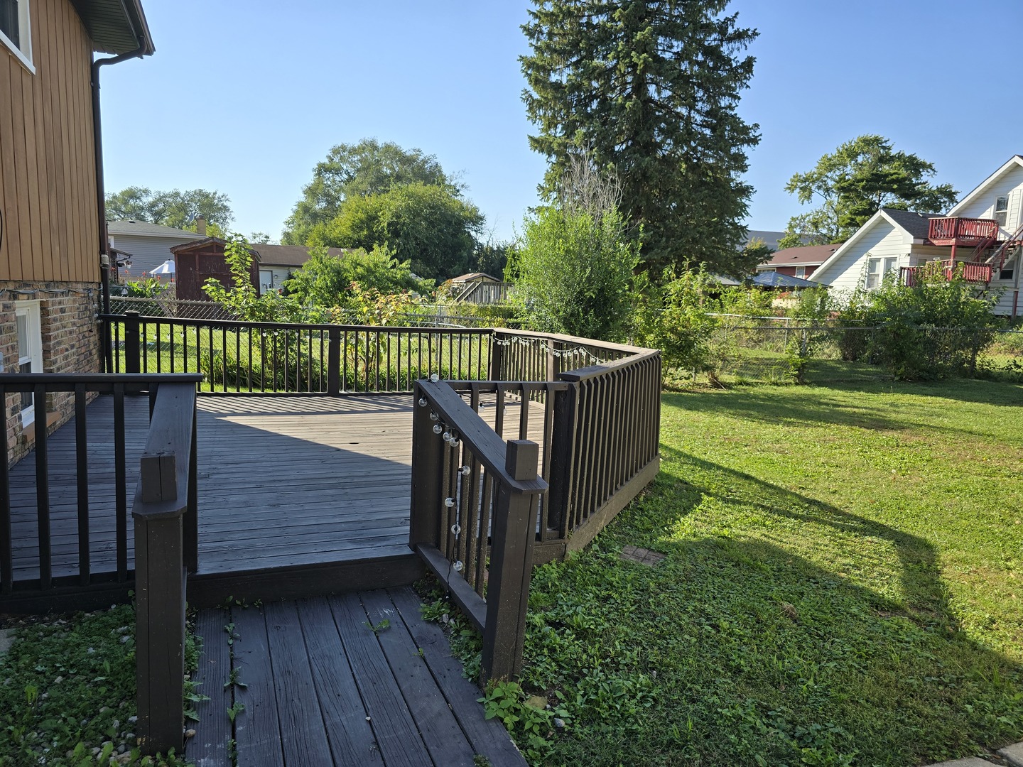 3618 148th Street Midlothian, IL 60445 - Photo 20 of 22 a view of a deck with a yard