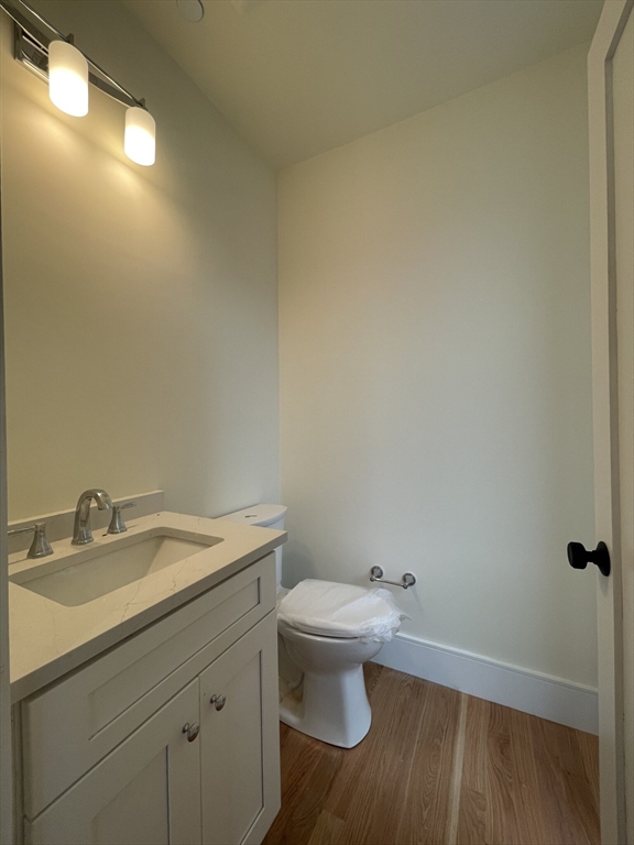 65 Cameron Street, Unit 4 Brookline, MA 02445 - Photo 12 of 13 a bathroom with a sink and a toilet