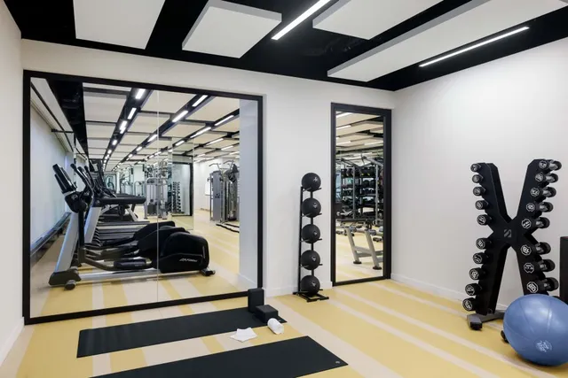 a view of a room with gym equipment