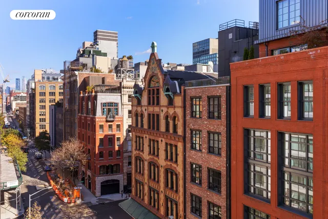 a view of a city with tall buildings