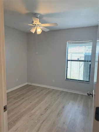 a view of storage and utility room with racks on the wall