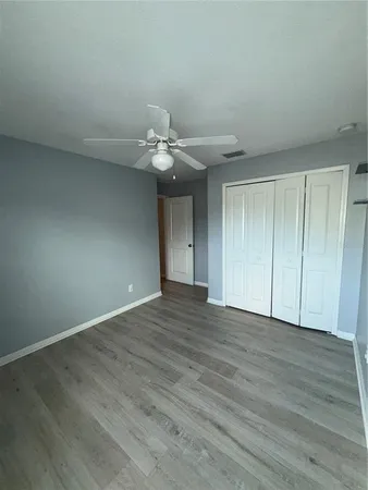 a view of storage and utility room with empty racks