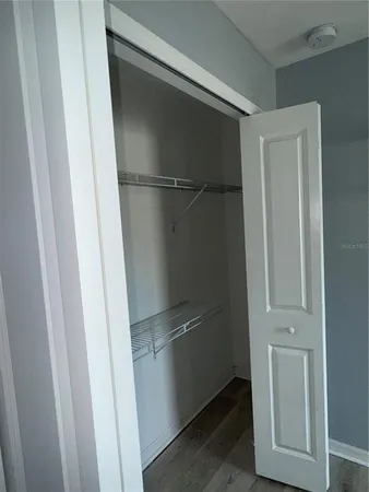 a view of a backyard with potted plants