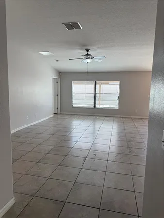 a kitchen with stainless steel appliances granite countertop a refrigerator sink and cabinets