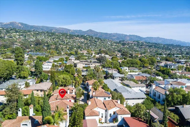 an aerial view of a city with lots of residential buildings