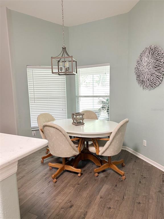 33632 Wesley Road Eustis, FL 32736 - Photo 13 of 34 a dining room with furniture and window