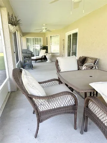 a living room with furniture and a table