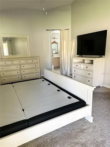 a living room with flat screen tv