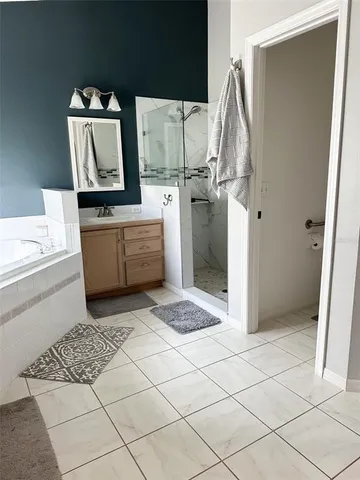 a room with a couch and a stove top oven