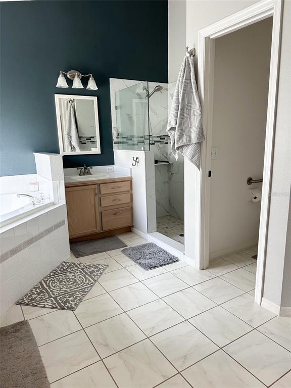 33632 Wesley Road Eustis, FL 32736 - Photo 26 of 34 a room with a couch and a stove top oven