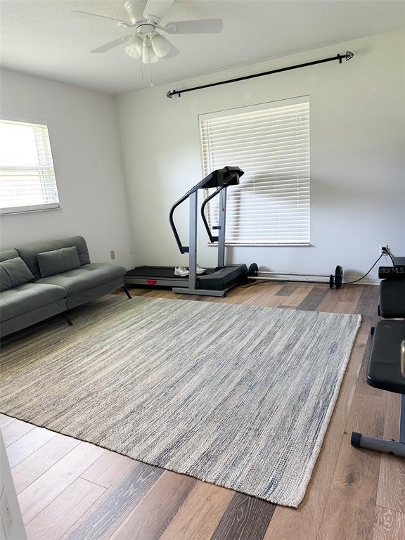 33632 Wesley Road Eustis, FL 32736 - Photo 29 of 34 a room with gym equipment and a window