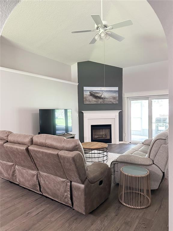 33632 Wesley Road Eustis, FL 32736 - Photo 6 of 34 a bedroom with a bed and a fireplace