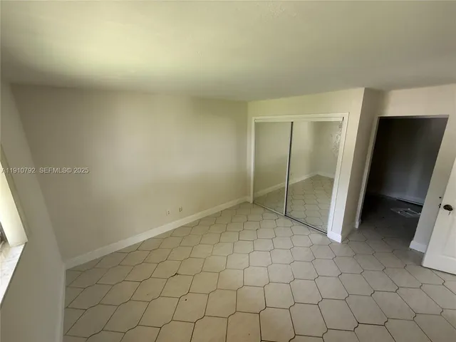 a living room with a rug