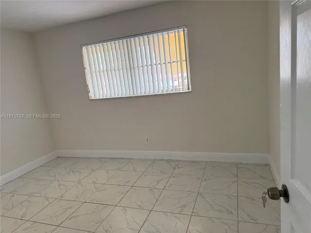 a view of kitchen with washer and dryer