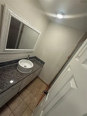 a view of a big room with windows and cabinet