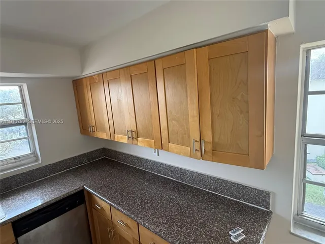 a view of swimming pool from a balcony