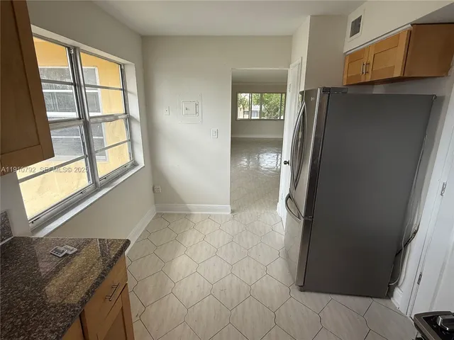 a view of a potted plants with large trees