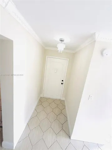 a view of a porch and backyard of a house