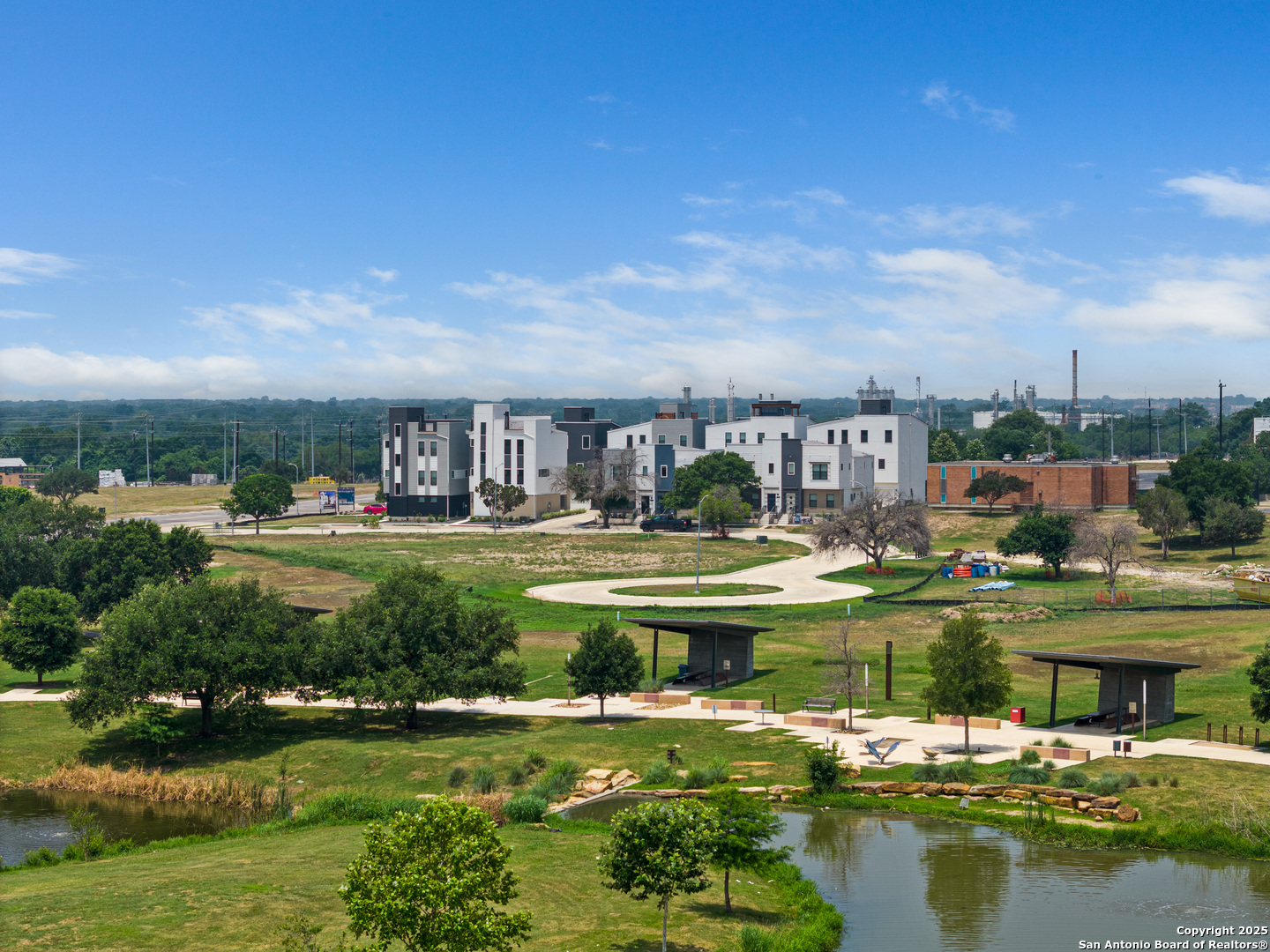a view of swimming pool with outdoor seating and yard