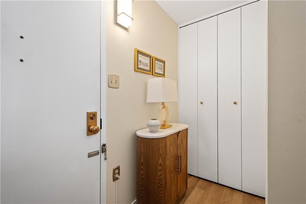 1150 Bower Hill Road, Unit 514B Pittsburgh, PA 15243 - Photo 19 of 44 a bathroom with a sink a mirror and a shower curtain