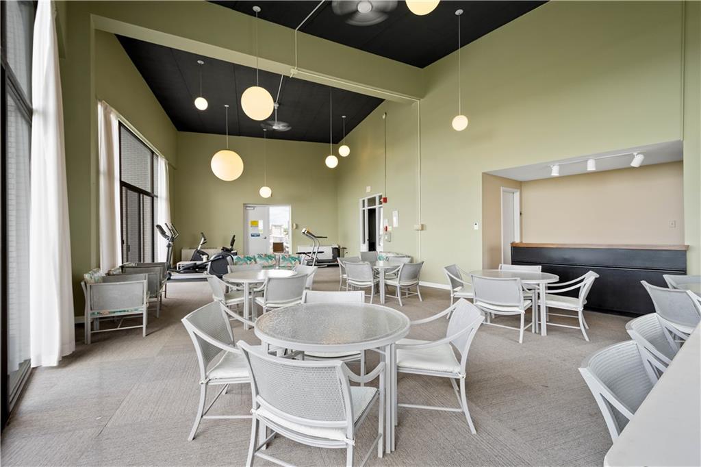1150 Bower Hill Road, Unit 514B Pittsburgh, PA 15243 - Photo 36 of 44 a kitchen with a dining table and chairs