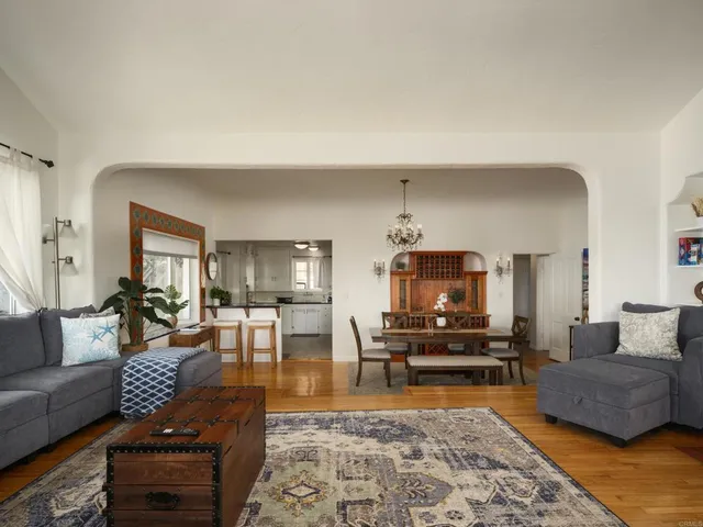 a living room with furniture and a rug