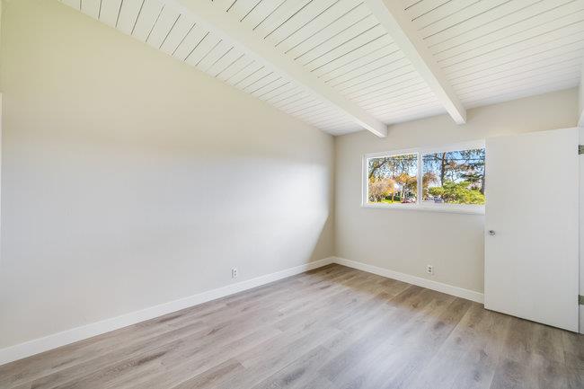 28207 Rochelle Avenue Hayward, CA 94544 - Photo 20 of 27 an empty room with wooden floor and window