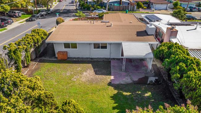 28207 Rochelle Avenue Hayward, CA 94544 - Photo 27 of 27 an aerial view of a house with swimming pool and large trees