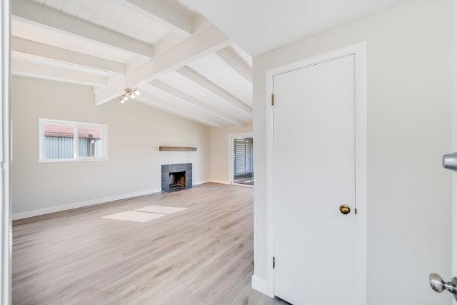 28207 Rochelle Avenue Hayward, CA 94544 - Photo 7 of 27 a view of a livingroom with wooden floor and a fireplace