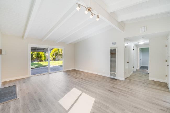 28207 Rochelle Avenue Hayward, CA 94544 - Photo 10 of 27 wooden floor in an empty room with a window