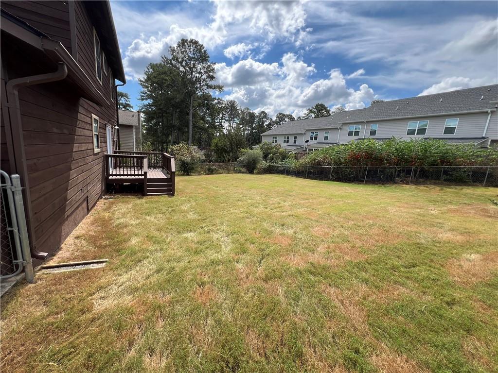893 Sandune Drive Norcross, GA 30093 - Photo 14 of 14 a view of a terrace with a garden