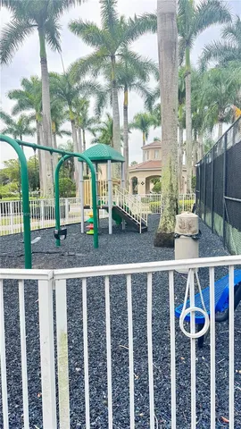 a view of a patio with a table chairs and table
