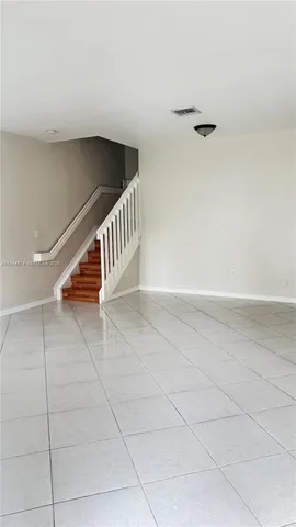 a view of an entryway with stairs